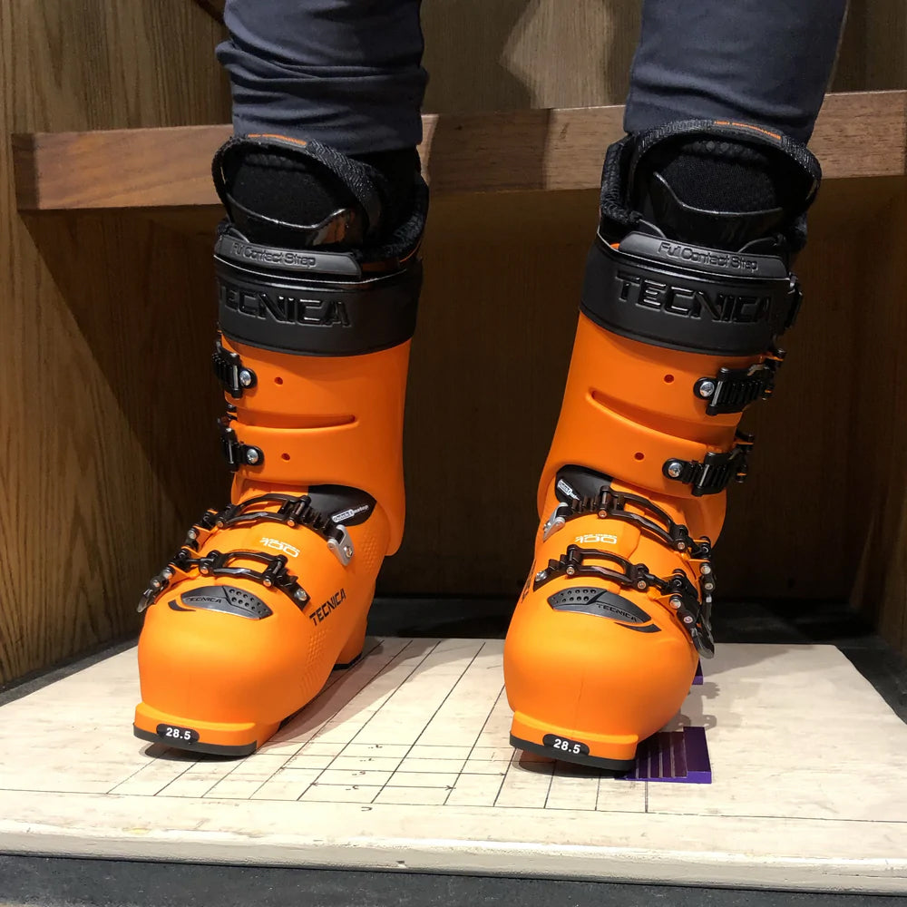 person standing in ski boots