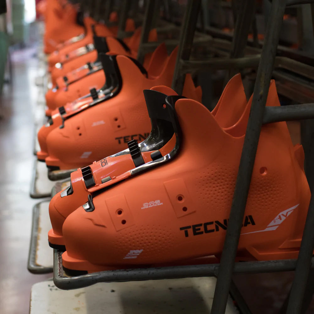 ski boots lined up in a row